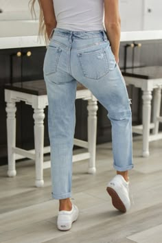 Our Mid Rise Boyfriend Jean comes in light-washed denim with distress and fading detail. Sits right at the natural waistline with a relaxed fit for a lived-in feel. This boyfriend jean can be worn folded at the hem for a more casual look, or unfolded for a more sophisticated look perfect for a night out. Comes with a classic 5-pocket design, single-button front, and zip-fly closure Model is 5’3” wearing a size 1/24 Inseam of a 1/24 is 26" 99% Cotton, 1% Spandex Boyfriend Pants Jeans, Simple Mom Outfits, Early Fall Fashion, Mid Rise Boyfriend Jeans, Boyfriend Outfit, Keds Style, Boyfriend Denim, Distressed Boyfriend Jeans, Boyfriend Jean