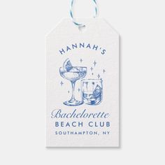 a blue and white gift tag with the name hannah's bachelor beach club