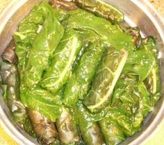 some green vegetables are in a silver bowl