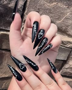 Acrylic Nails Coffin Short Gothic, Dark Vday Nails, Long Dark Nails Inspiration, Black Stiletto Nails With Rhinestones, Black Nails Acrylic Stilettos, Nail Ideas Dark Colors, Dark Long Nails, Heart Stiletto Nails, Stilleto Nail Ideas