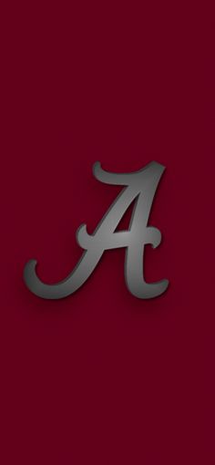 the university of alabama logo on a red background with silver letters and an arrow in the middle