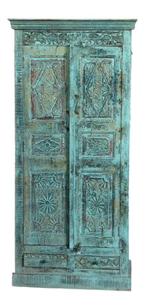 an old wooden door with decorative carvings on the front and side panels, isolated against a white background