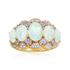 Ross-Simons - Ethiopian Opal, .45ct t. w. Tanzanite Ring, Diamonds in 14kt Yellow Gold. Size 8. The look of magnificence: This ring presents five luminous Ethiopian opals (6x4-8x6mm) trimmed with .45 ct. t. w. tanzanites and diamond accents. 1/2" wide. Tanzanite and opal ring. Opal birthstones are the perfect gift for October birthdays. October Birthdays, Opal Birthstone, October Birthday, Ring Opal, Tanzanite Ring, Opal Ring, Opal Rings, Ethiopian Opal, Jewelry Rings