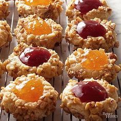 cookies with jelly and oatmeal are cooling on a rack