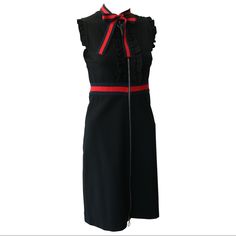 Experience The Epitome Of Elegance With The Gucci Black Bow Knot Dress, A True Masterpiece In Fashion. The Dress Is Exquisitely Adorned With Knitted Web Trim, Gracefully Accentuating The Waistband And Neckline, Culminating In A Charming Decorative Bow. Crafted From Luxurious Black Compact Viscose Jersey, This Dress Features Captivating Blue And Red Knitted Web Details, Adding A Touch Of Gucci's Signature Style. The Front Placket And Sleeves Boast Delicate Ruffle Detailing, Elevating The Dress To New Heights Of Sophistication. Designed With Both Style And Convenience In Mind, The Dress Is Equipped With A Front Zip For Easy Wear. Originally Priced At $1800, This Authentic Gucci Dress Is An I Sleeveless Gucci Cocktail Dress, Gucci Sleeveless Formal Dress, Gucci Sleeveless Cocktail Dress, Sleeveless Formal Gucci Dress, Chic Sleeveless Gucci Dress, Chic Gucci Sleeveless Dress, Gucci Knee-length Cocktail Dress, Gucci Black Evening Dress, Elegant Black Gucci Dress