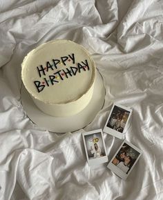 a birthday cake with the words happy birthday written on it next to four polaroid photos