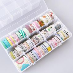 a box filled with lots of different types of washi tapes