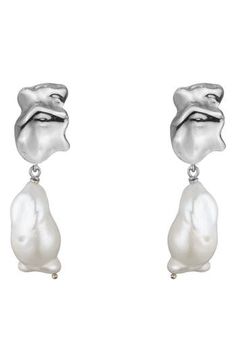 Modern and abstract, these handcrafted drop earrings are anchored baroque freshwater pearls that enhance their organic inspiration. 1 1/4" drop; 3/8" width Pearl size: 9–10mm 14k-gold plate/freshwater pearl Made in the USA