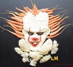 a creepy clown mask with carrots on it's head and hair in the shape of a face