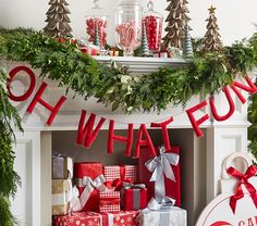 a mantel with christmas decorations and presents on it, along with the words what fun?