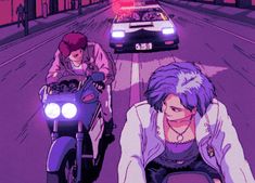 two people riding motorcycles on a city street at night with the sun setting behind them