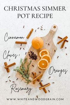 a cutting board topped with oranges and spices next to cinnamon sticks on top of it