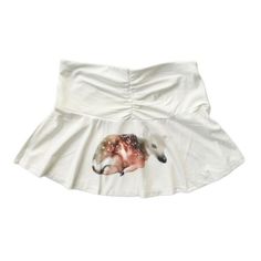 a white skirt with an animal print on it