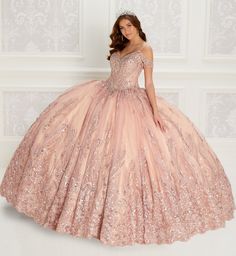 Off-the-shoulder novelty sequin ball gown with a v-neck, lace appliques and beading on the neckline, basque waist, corset back, and stone accents throughout. Sequin small cape included Rose Gold Dama Dresses Quinceanera, Pink Quinceanera Dresses Rose Gold, Quinceanera Dresses Rose Gold, Gold Dama Dresses, Rose Gold Quince Dress, Gold Quince Dress, Gold Quinceanera Dresses, Rose Gold Quinceanera Dresses, Rose Gold Quinceanera