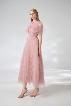 Crafted from high-quality organza fabric, this dress features a round neck and ankle-length design, perfect for any special occasion or event. The layered design adds a touch of finesse, making you stand out in the crowd. Elegant Pink Tulle Midi Dress, Organza Floor-length Evening Dress, Evening Floor-length Organza Dress, Elegant Organza Midi Dress With Ruffles, Sheer Feminine Floor-length Dress, Feminine Sheer Floor-length Dress, Spring Formal Organza Dresses, Organza Midi-length Evening Dress, Organza Midi Length Evening Dress