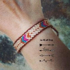 a bracelet with an arrow on the wrist