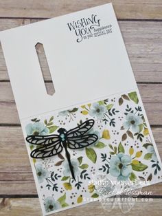 a card with a dragonfly on it