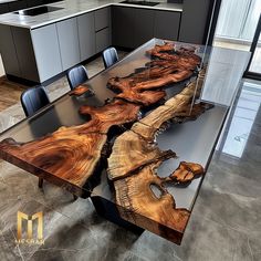 the table is made out of wood and has chairs around it, along with other furniture