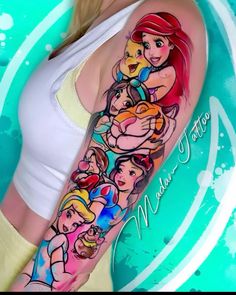 a woman's arm with some cartoon characters on it