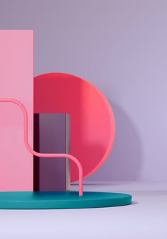 a pink chair sitting in front of a purple and pink wall next to a blue stand