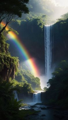 a waterfall with a rainbow in the middle