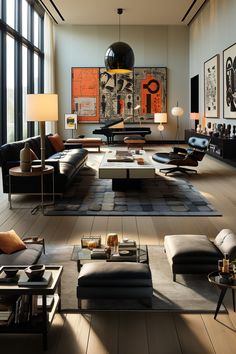 a living room filled with lots of furniture and art on the wall above it's windows