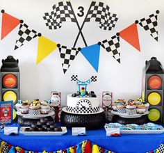 a race themed birthday party with cars and flags