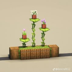 some plants that are sitting on top of each other in the grass and flowers growing out of them