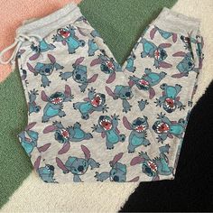 New Without Tags Disney Lilo And Stitch All Over Graphic Elastic/Drawstring Waist, Elastic Ankle Jogger Sweatpants With Pockets. 60% Cotton 40% Polyester. #B15 Stitch Sweatpants, Disney Pants, Sweatpants With Pockets, Disney Lilo, Disney Stitch, Stitch Disney, Jogger Sweatpants, Lilo And Stitch, Birthday Ideas