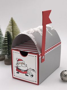 a mail box with a santa clause on it