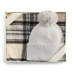 Spruce up your cool weather wardrobe with this women's pompom beanie and plaid scarf duo from Nine West.Spruce up your cool weather wardrobe with this women's pompom beanie and plaid scarf duo from Nine West. How do you accessorize? Check out our ACCESSORIES GUIDE for essential tips to elevate your style with must-have accessories.FEATURES Includes scarf, beanie & gift box Hat: 0.5-in. brim, 8.5"H x 8.5"W, faux fur pompom Scarf: 21"W x 72"L + 1" self fringe, allover plaid print LightweightFABRIC Accessories Guide, Pompom Beanie, Pompom Scarf, Box Hat, Cool Weather, Plaid Print, Plaid Scarf, Nine West, Faux Fur