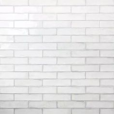 a white brick wall with no mortars on it