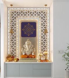 an image of a buddha statue in the middle of a room with lights on it