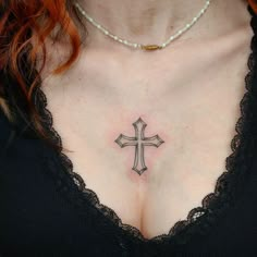 30+ Cross Tattoo Design Ideas for Men and Women Cross In Middle Of Chest Tattoo, Edgy Chest Tattoos For Women, Cross In Between Chest Tattoo Female, Cross Collarbone Tattoo, Cross On Chest Tattoo Woman, Cross Between Breast Tattoo, Cross Throat Tattoo, Cross Sternum Tattoo Women, Cross Sternum Tattoo