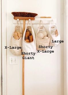 three bags hanging on a coat rack with the words large, shorty, and large giant