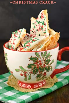 christmas crackers in a cup on a green and white checkered tablecloth with the title overlay