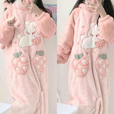 Dive into the sweetness of dreams with our Strawberry Kawaii Pajamas. Crafted with a soft, plush fabric, the oversized bunny ears add a touch of whimsy, while the embroidered strawberries and fluffy pockets inject a playful charm. Ideal for those who cherish comfort as much as style, these pajamas will make every night a slumber party. Whether it's for a cozy movie night or a restful sleep, these are sure to become your go-to for a night sprinkled with fun and coziness. Strawberry Pajamas, Strawberry Kawaii, Princesscore Cottagecore, Kawaii Academia, Kawaii Pajamas, Fairytale Fashion, Cottagecore Coquette, Kawaii Stuff, Pajama Dress