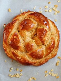 a close up of a pastry on a piece of paper with words gingerbread challah