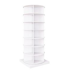 a tall white shelf with six shelves on each side and four smaller sections in the middle