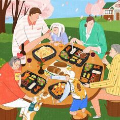 a family sitting around a table with food on it