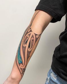 a person with a tattoo on their arm