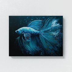 a painting of a blue fish on a black background is hanging on a white wall