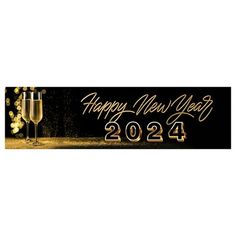 a happy new year banner with champagne glasses