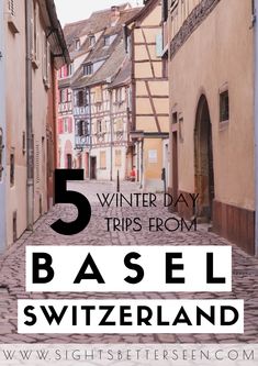 a cobblestone street with the words 5 winter day trips from basel switzerland