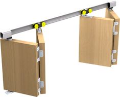 a pair of sliding doors that are attached to the side of a wall with yellow balls on them