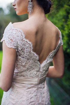 the back of a woman's wedding dress