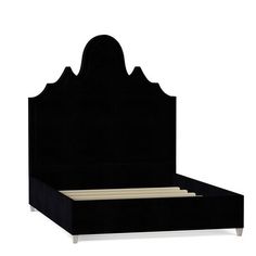 the bed frame is made up with black velvet