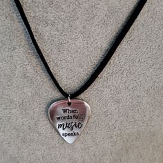 New With Tags This Mens Custom Handmade Silver Guitar Pick Charm Necklace Is 18 Inches Long. It Has A 3 Inch Extender And Lobster Clasp. The Charm Measures 1 1/2 X 1 Inches And Says " When Words Fail, Music Speaks". When Words Fail Music Speaks, Pandora Rings Princess, Feather Cuff Bracelet, When Words Fail, Silver Guitar, Guitar Pick Necklace, Stainless Steel Cross Pendant, Chain Fashion, Skull Pendant