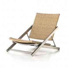 a chair that is made out of wicker and metal frame, with the seat folded back