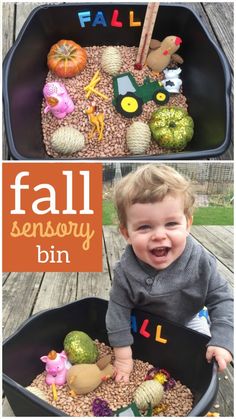 a toddler playing with some fake plants and toys in a bowl that says fall sensory bin